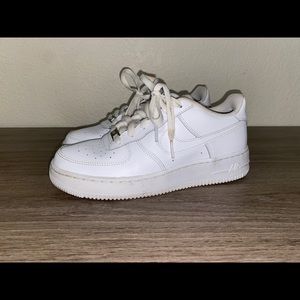 White Nike Air Forces.